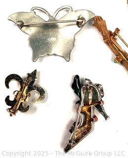 Six (6) Brooches and Bracelet