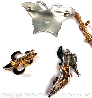 Six (6) Brooches and Bracelet