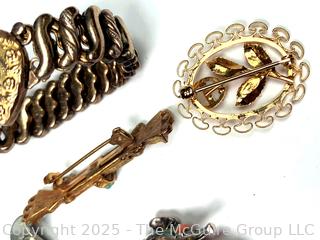 Six (6) Brooches and Bracelet