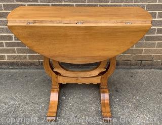 Round Drop Leaf Coaching Table with Lyre-Shaped Swivel Supports.  36" diameter