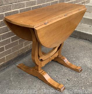 Round Drop Leaf Coaching Table with Lyre-Shaped Swivel Supports.  36" diameter