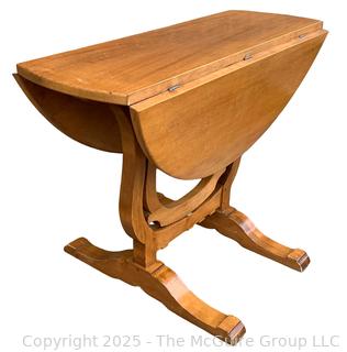 Round Drop Leaf Coaching Table with Lyre-Shaped Swivel Supports.  36" diameter