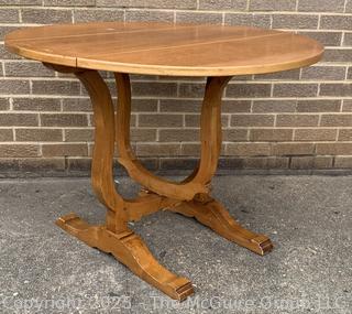 Round Drop Leaf Coaching Table with Lyre-Shaped Swivel Supports.  36" diameter