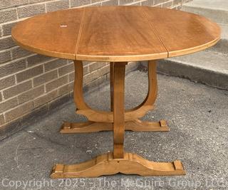 Round Drop Leaf Coaching Table with Lyre-Shaped Swivel Supports.  36" diameter