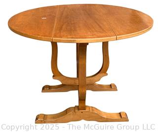 Round Drop Leaf Coaching Table with Lyre-Shaped Swivel Supports.  36" diameter