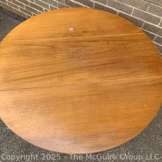 Round Drop Leaf Coaching Table with Lyre-Shaped Swivel Supports.  36" diameter