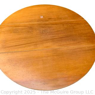 Round Drop Leaf Coaching Table with Lyre-Shaped Swivel Supports.  36" diameter