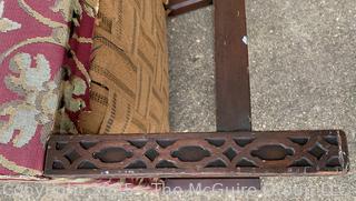 Upholstered Mahogany Chippendale Lolling Chair with Blind Fretwork Legs.  Stain on seat. 41"H x 27"W x 27"D