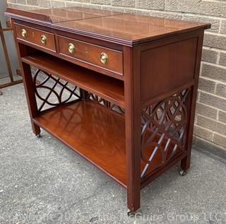 Upholstered Mahogany Chippendale Lolling Chair with Blind Fretwork Legs.  Stain on seat. 41"H x 27"W x 27"D