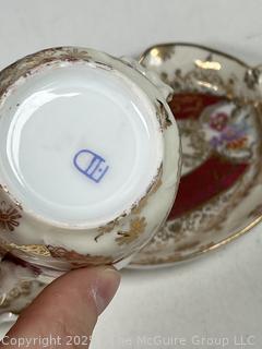 Porcelain and Ruby Red Glassware