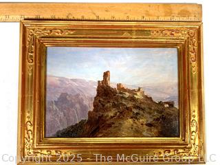 Gilt Framed Oil on Wood of Ruins on Precipice Signed by Artist Saul Guigo, 1871.  Restored by Justine Wimsatt, Wimsatt & Assoc in 2002.  9" x 12"