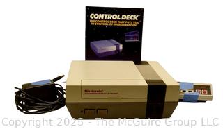 Nintendo NES Console & Accessories.  Untested, power lights up.  Toy