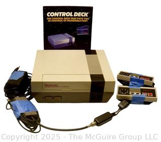 Nintendo NES Console & Accessories.  Untested, power lights up.  Toy