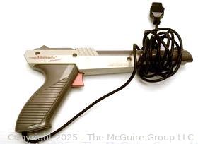 Nintendo Shooter and Two (2) Software Cartridges