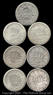Lot of Seven (7) Swiss 1/2 Fr. Silver Coins, Various Dates