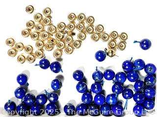 Loose Lapis Beads and 14kt Yellow Gold Spacers.  Spacers weigh 5 grams 