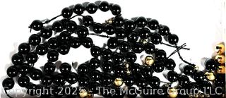 Loose Onxy Beads with 14kt Yellow Gold Bead Spacers.  Gold Spacers weigh 2 grams