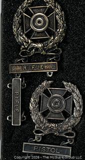 Two (2) U.S. Army Expert Marksmanship Badges With Three (3) Qualification Bars.