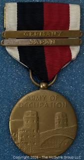 World War II Army Of Occupation Medal With Germany and Japan Bars On Ribbon