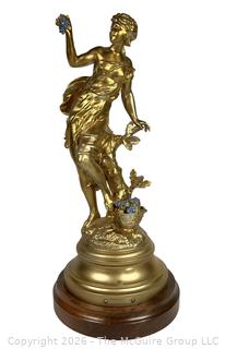 Cast Metal Statue of Return of the Harvest on Wood Base by Sculptor Charles Octave Levy (French, 1820-1899).  Made in Paris.  