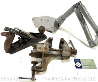 Group of Vintage Hand Tools Including Stanley Hand Planer, Bench Vice and folding entrenching tool