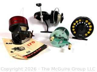 Four (4) Fishing Reels Including Garcia & Mitchel