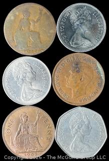 Six (6) Foreign coins in plastic holders, various dates and denominations. Great Britain 
