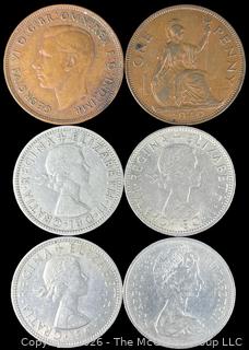 Six (6) Foreign coins in plastic holders, various dates and denominations. Great Britain