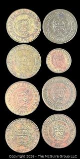 Eight (8) Foreign coins, various dates and denominations: Peru