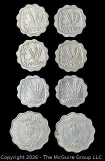 Eight (8) foreign coins, various dates and denominations: Isreal 