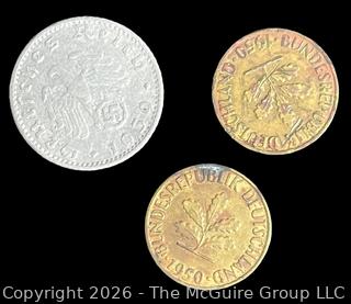 Three (3) foreign coins, various dates and denominations: Germany