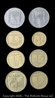 Eight (8) foreign coins, various dates and denominations: Isreal