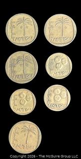 Seven (7) foreign coins, various dates and denominations: Isreal