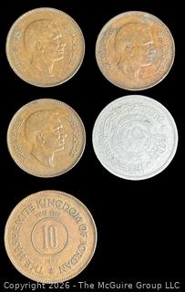 Five (5) foreign coins, various dates and denominations: Jordan