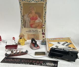 Cheesecake Calendar, Wind-Up Toy Locomotive, Rolling Stone Magazine, Toys, and Abacus