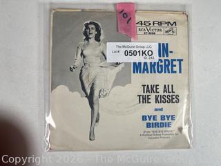 Collectable vinyl 45 rpm records with picture sleeves: