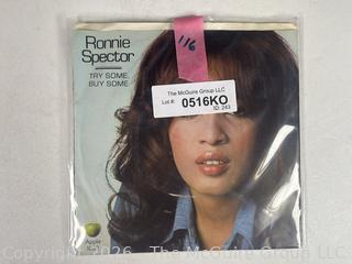 Collectable vinyl 45 rpm records with picture sleeves: