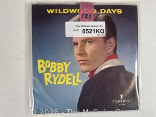Collectable vinyl 45 rpm records with picture sleeves: