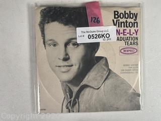 Collectable vinyl 45 rpm records with picture sleeves: