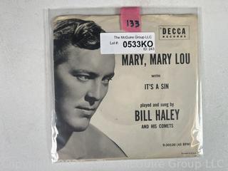 Collectable vinyl 45 rpm records with picture sleeves: