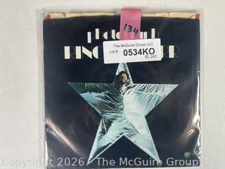 Collectable vinyl 45 rpm records with picture sleeves: