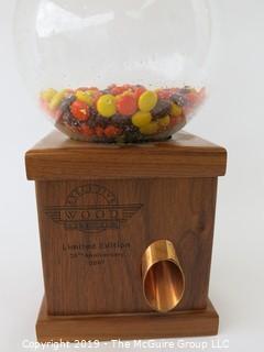 Furniture: Office desktop candy dispenser.