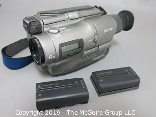 Camera: Sony Hi8 Handycam w/2 batteries. Missing cords.