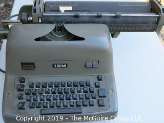 Early IBM Electric Typewriter with two carriages and supplies; does not power on