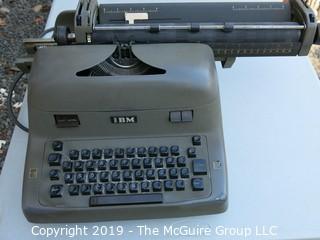 Early IBM Electric Typewriter with two carriages and supplies; does not power on