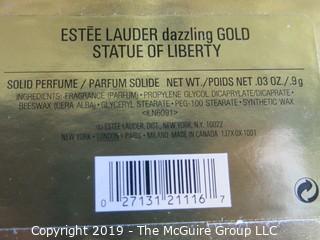 Collectable: Estee Lauder Solid Perfume Gold Statue of Liberty in Original Box from 2000