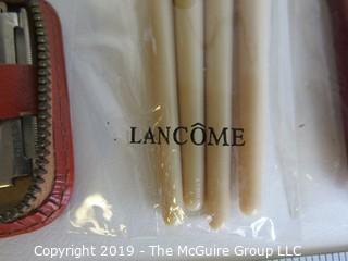 Collectable: Lancome Cosmetic Brushes in original packaging, Gillette Straight Razor in Travel Case, Mother of Pearl Spoon and Perfume Bottle