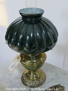 Collectible: Kerosene lamp: Electrified: Metal base Table Lamp; 25" T with petal embossed green shade 