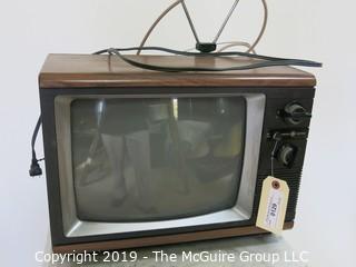 Collectible: Household: Furniture: 1980's GE 12"D B & W TV; powers up