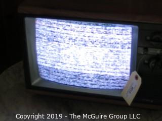 Collectible: Household: Furniture: 1980's GE 12"D B & W TV; powers up